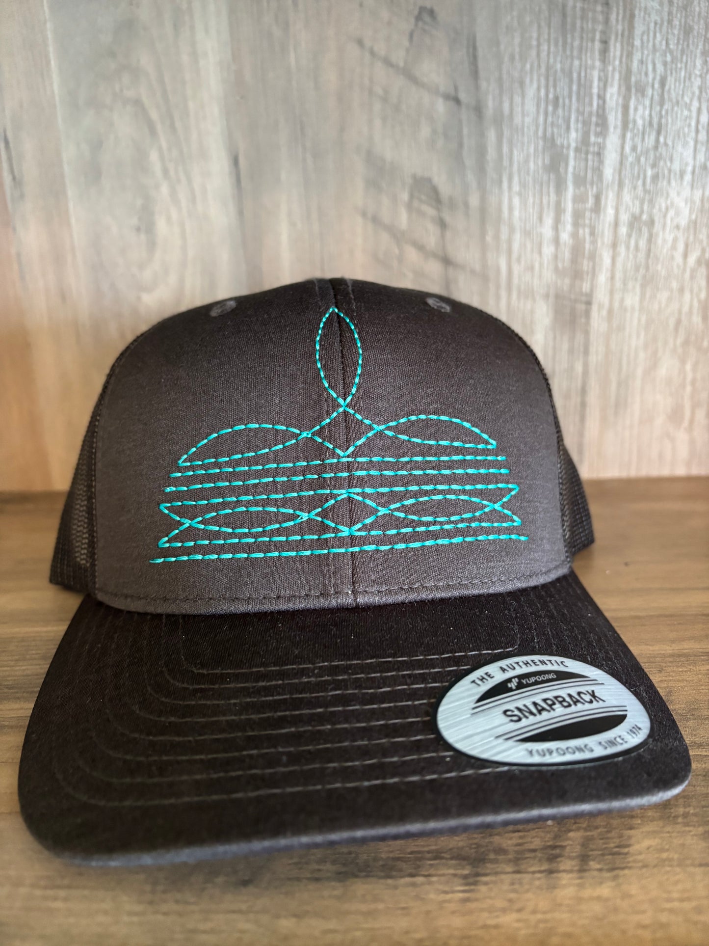 Boot Stitch Embroidered Structured Trucker Hat with Mesh back, Snapback closure, Custom made with your choice of hat and thread color.
